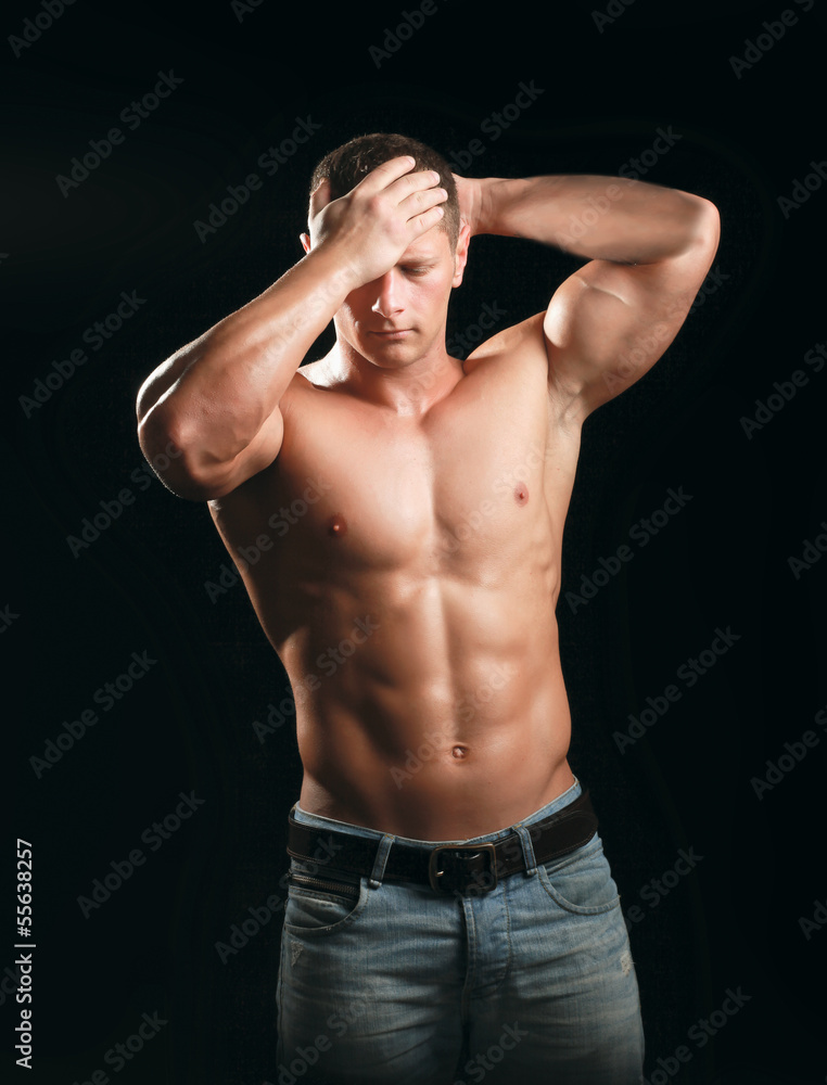 Handsome young man having a strong headache Handsome young man having a strong headache