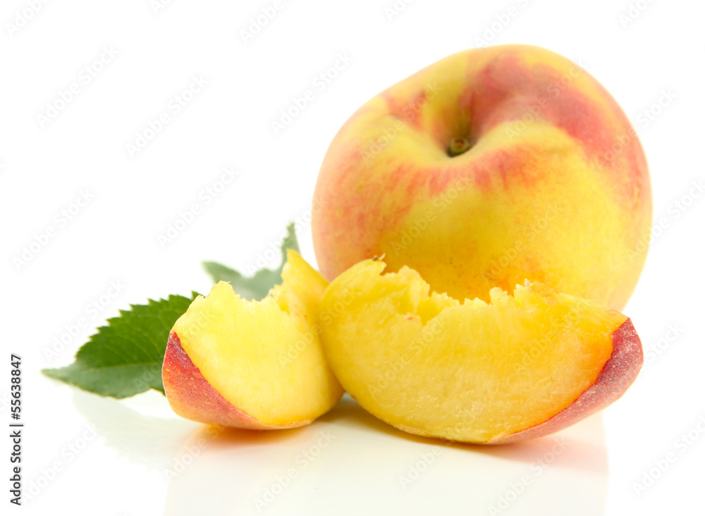 Ripe sweet peach with leaves, isolated on white Ripe sweet peach with leaves, isolated on white