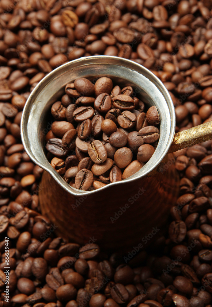 Fototapeta premium Metal turk on coffee beans background