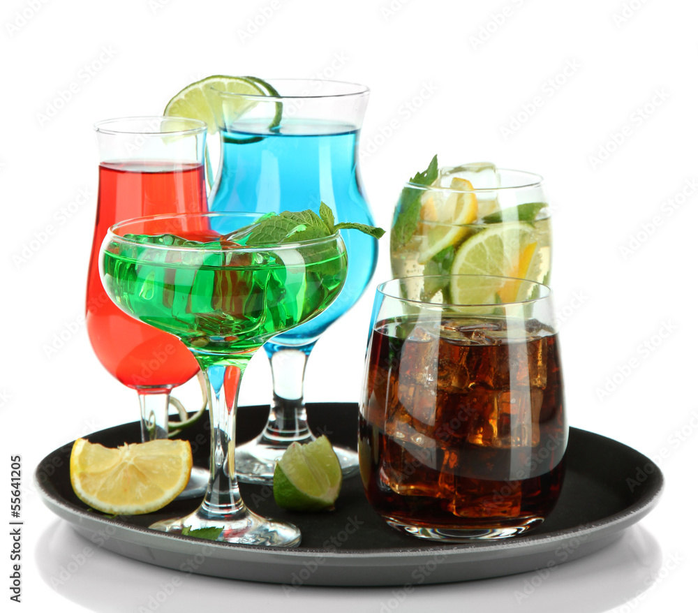 Many glasses of cocktails on tray, isolated on white
