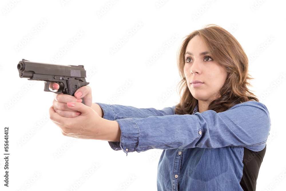 Young brunette woman with gun isolated on white Young brunette woman with gun isolated on white
