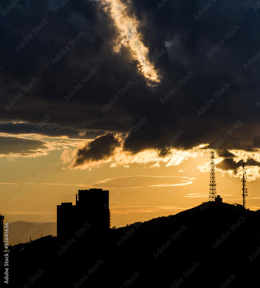 Sunset and silhouette of buildings.