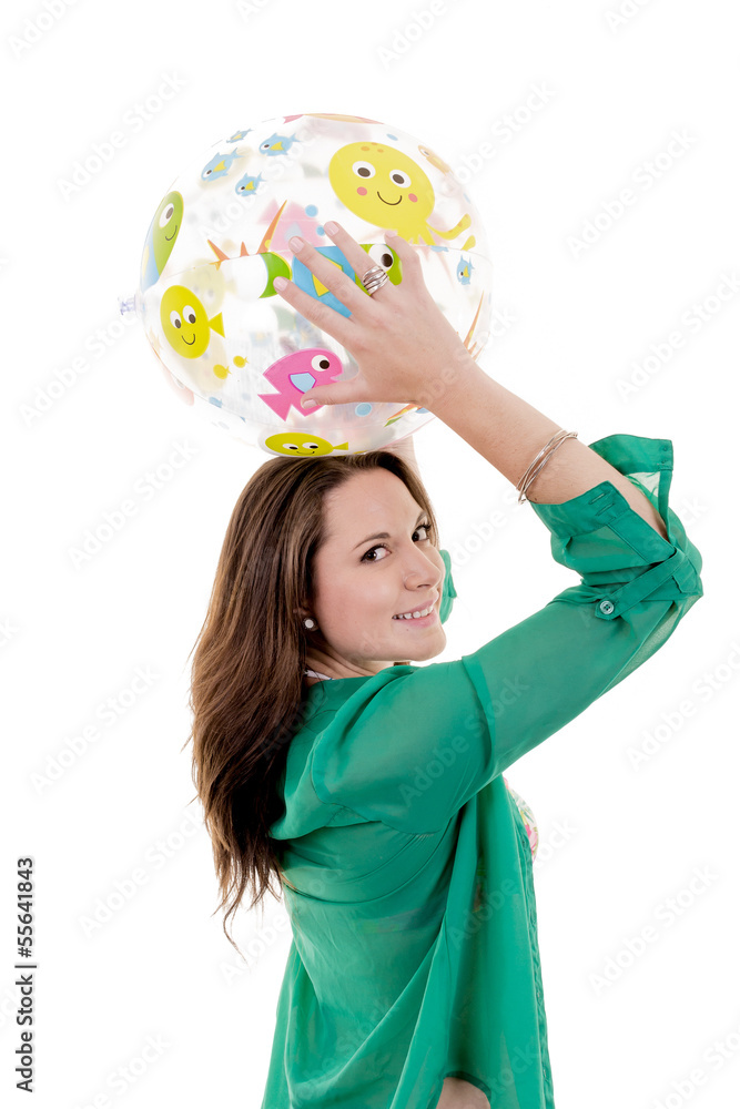 Happy beautiful woman holding a beach ball, white background Happy beautiful woman holding a beach ball, white background