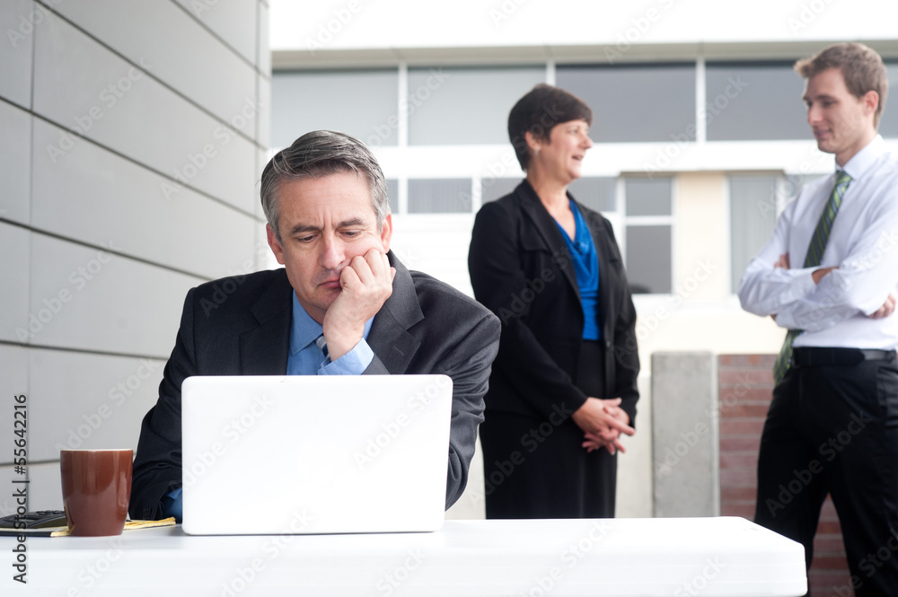 Businessman under stress, fatigue and headache