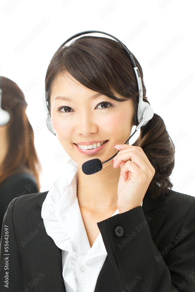 Beautiful asian business operator isolated on white background