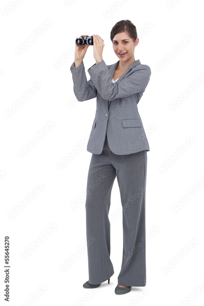 Businesswoman posing with binoculars Businesswoman posing with binoculars