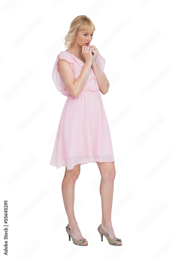 Worried blonde posing