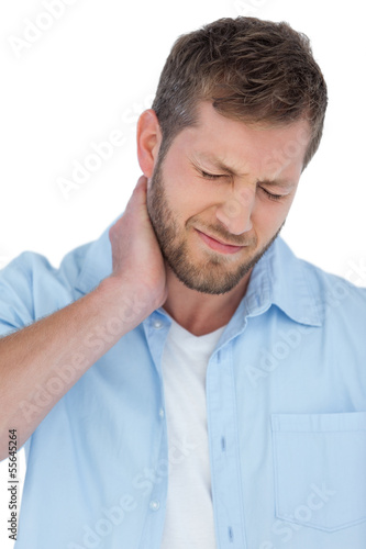 Trendy model having a painful neck