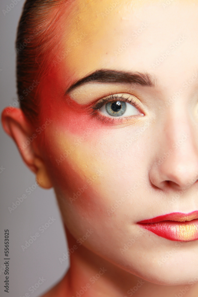 beautiful make up of bright lips, isolated on grey background beautiful make up of bright lips, isolated on grey background