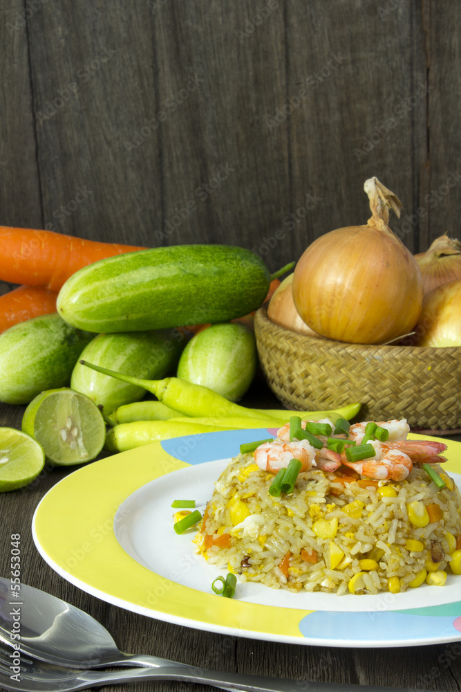 Fried rice with shrimp on the wood table Fried rice with shrimp on the wood table