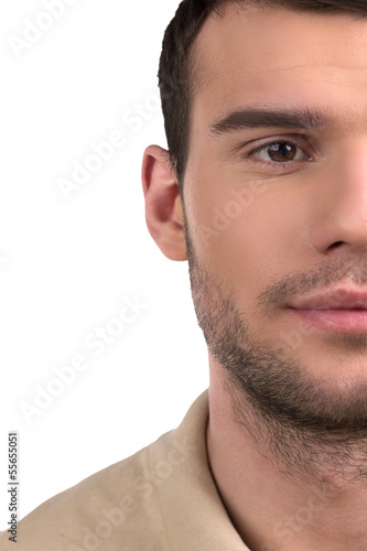 Young man. Cropped image of handsome young man isolated on white