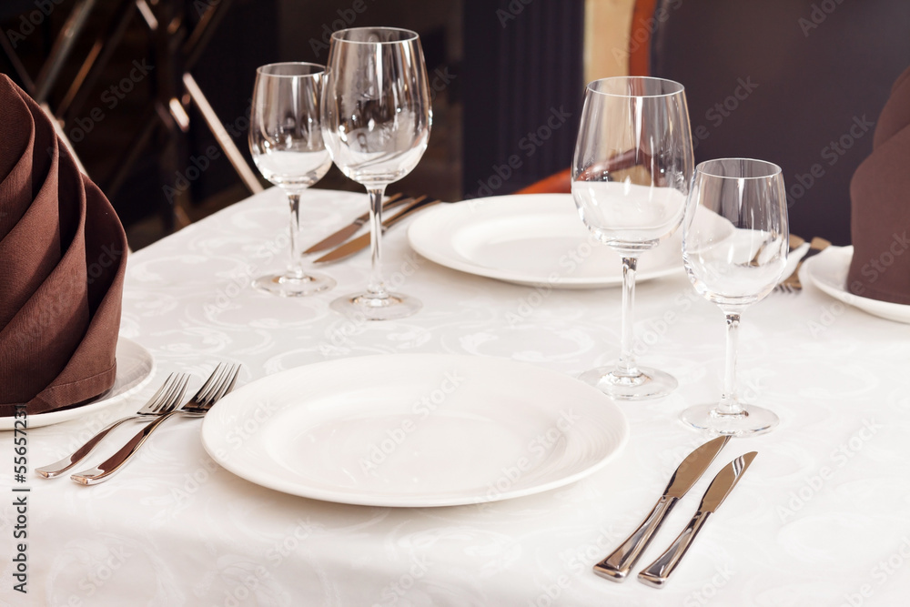 Tables set for meal Tables set for meal