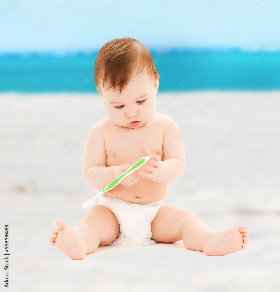little baby playing with toothbrush little baby playing with toothbrush