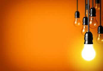 Idea concept on orange background.