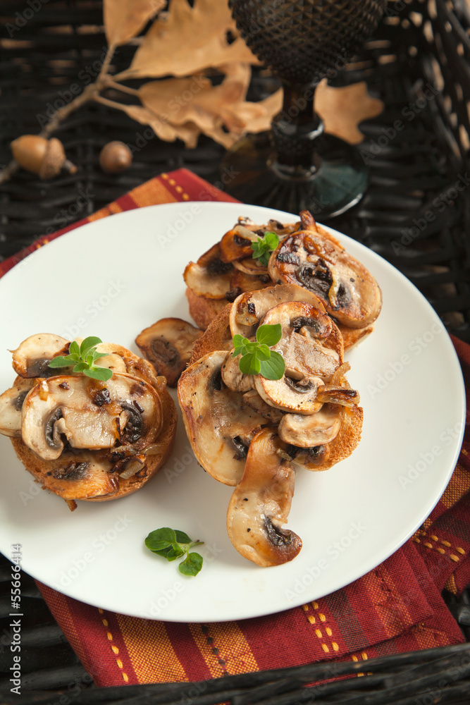 Fried mushrooms on toasted bread