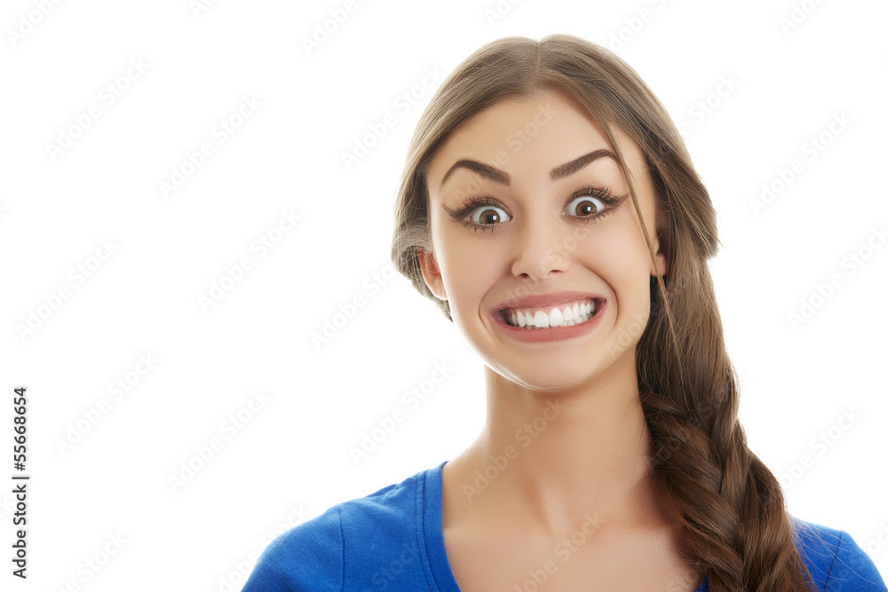 Beautiful excited funny young woman with big smile on her face Beautiful excited funny young woman with big smile on her face