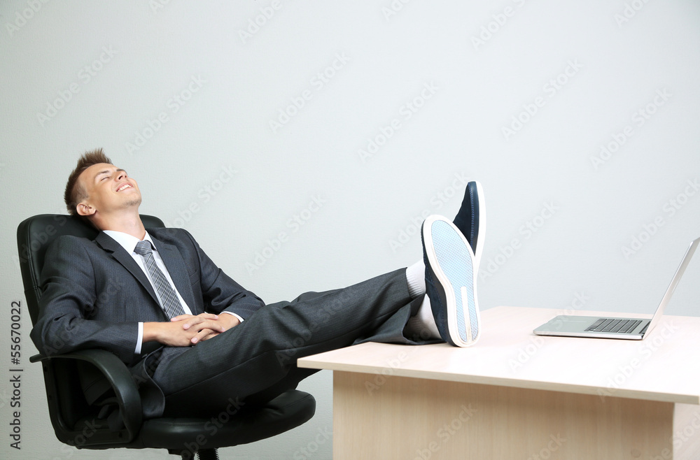 Portrait of young businessman in office Portrait of young businessman in office