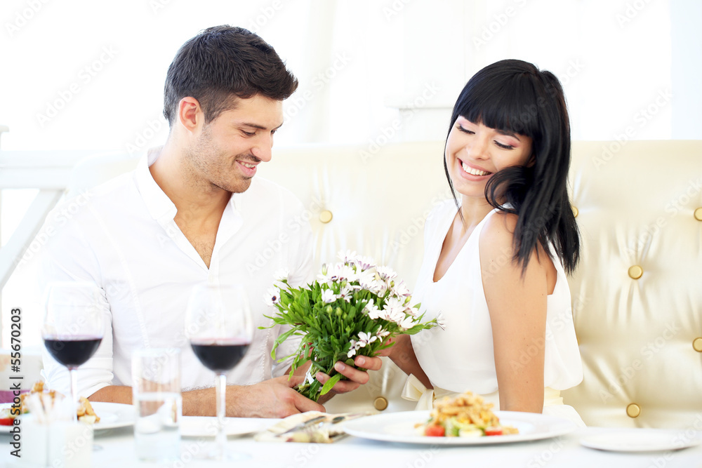 Beautiful couple having romantic dinner at restaurant Beautiful couple having romantic dinner at restaurant