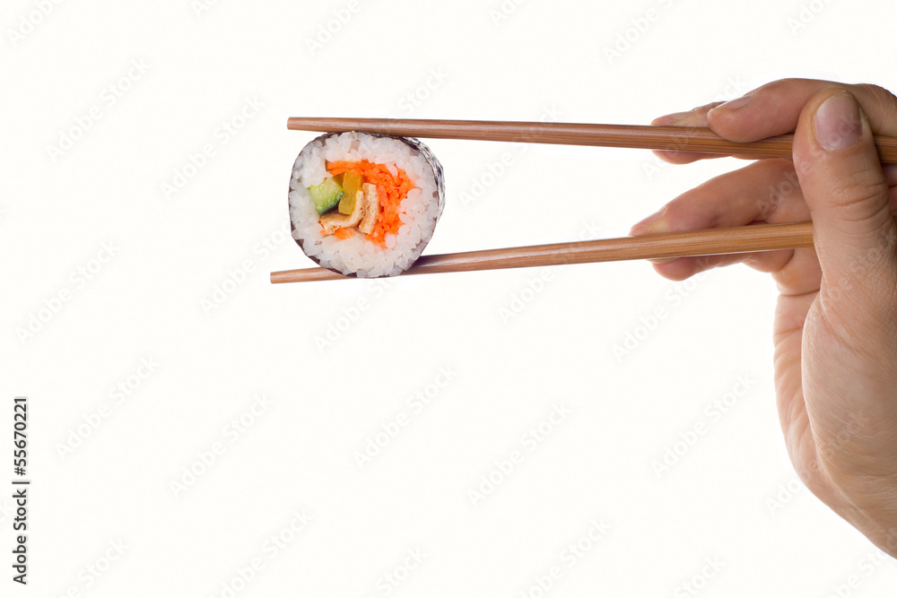 Sushi roll and chopsticks Sushi roll and chopsticks