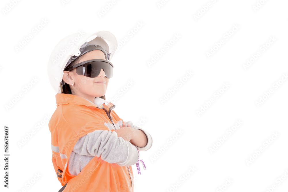 young girl construction worker in a hard hat and vest