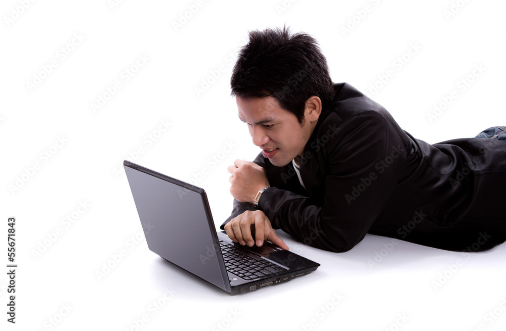 Portrait of business man lying with laptop isolated on white bac Portrait of business man lying with laptop isolated on white bac