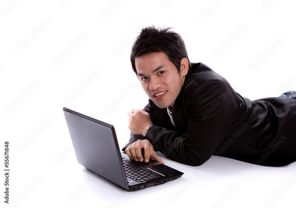 Portrait of business man lying with laptop isolated on white bac Portrait of business man lying with laptop isolated on white bac
