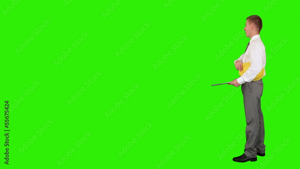 Young architect taking notes, walk in,Green Screen Young architect taking notes, walk in,Green Screen