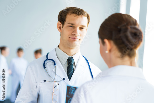 Doctor talking with a colleague