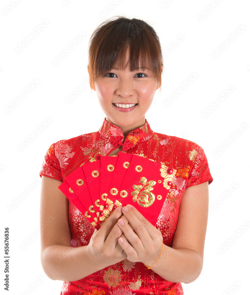 Chinese cheongsam girl holding red packets Chinese cheongsam girl holding red packets