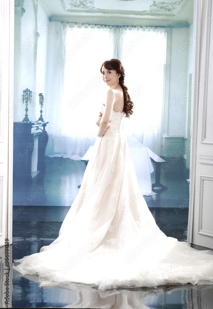 young and beautiful bridge in dress holding bouquet flower young and beautiful bridge in dress holding bouquet flower