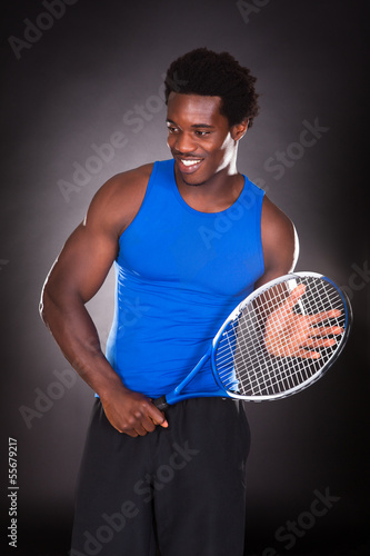 African Man With Tennis Racket © Andrey Popov