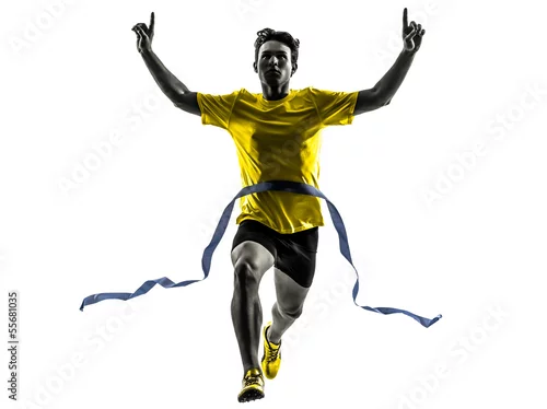 Obraz młody człowiek sprinter biegacz z systemem zwycięzca linii mety sylwetka