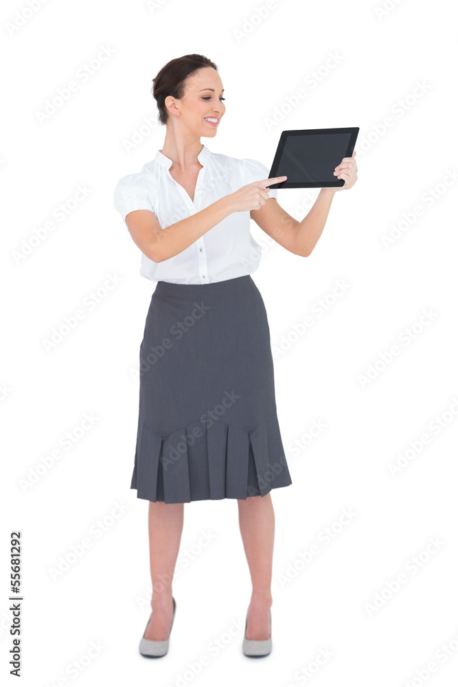 Cheerful businesswoman showing something on her tablet pc Cheerful businesswoman showing something on her tablet pc