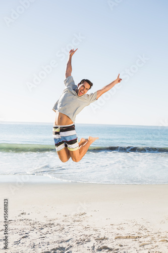 Energetic handsome man jumping