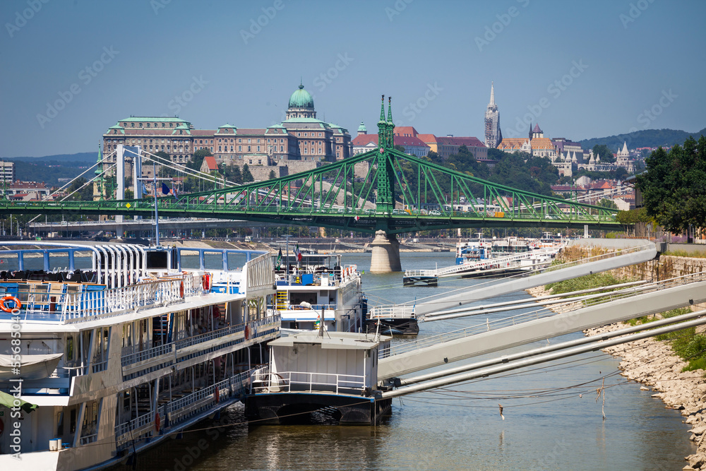 Cruise ships docked on Danube river shore in Budapest