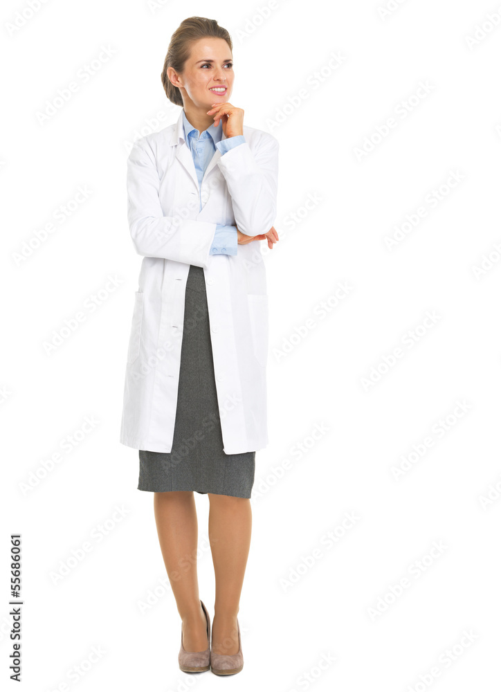 Portrait of thoughtful woman in white robe looking on copy space Portrait of thoughtful woman in white robe looking on copy space