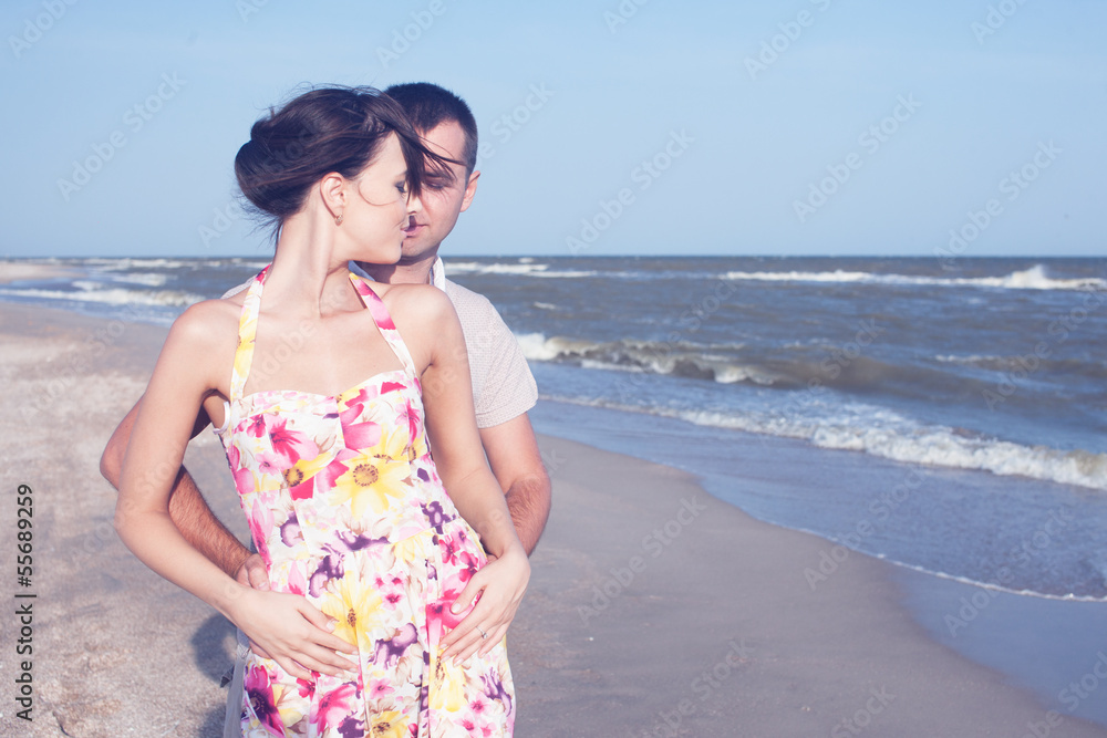 Passionate heterosexual couple on the seashore Passionate heterosexual couple on the seashore