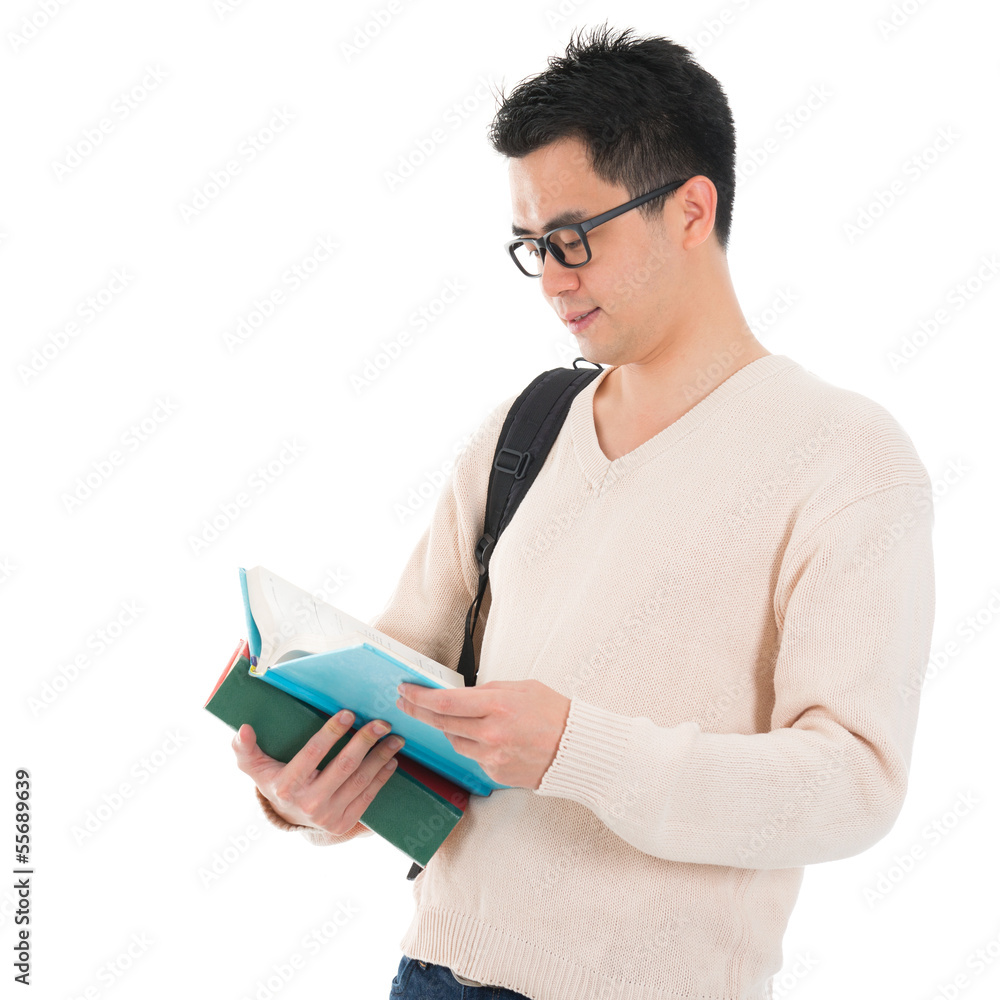 Asian adult student reading book Asian adult student reading book