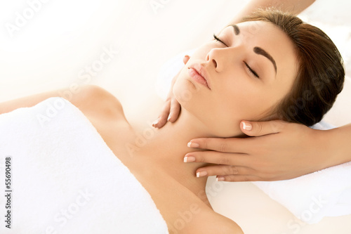 Spa Woman. Close-up of a young woman getting spa treatment. Face