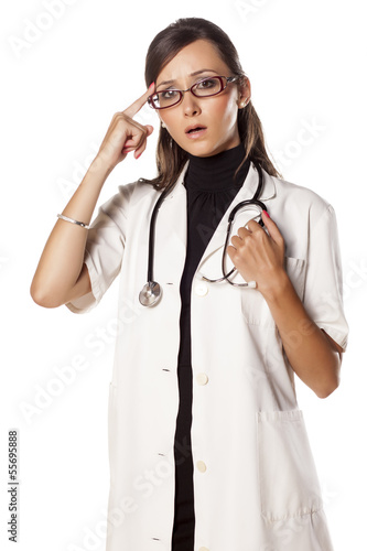 young and sad woman doctor neck touching her head