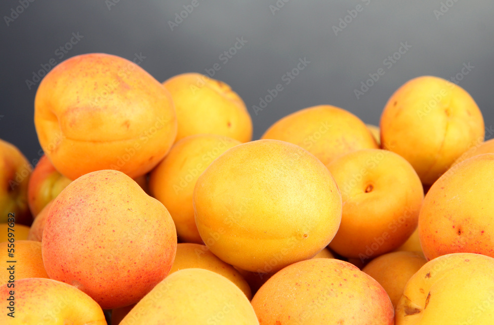 Fresh natural apricot on grey background Fresh natural apricot on grey background