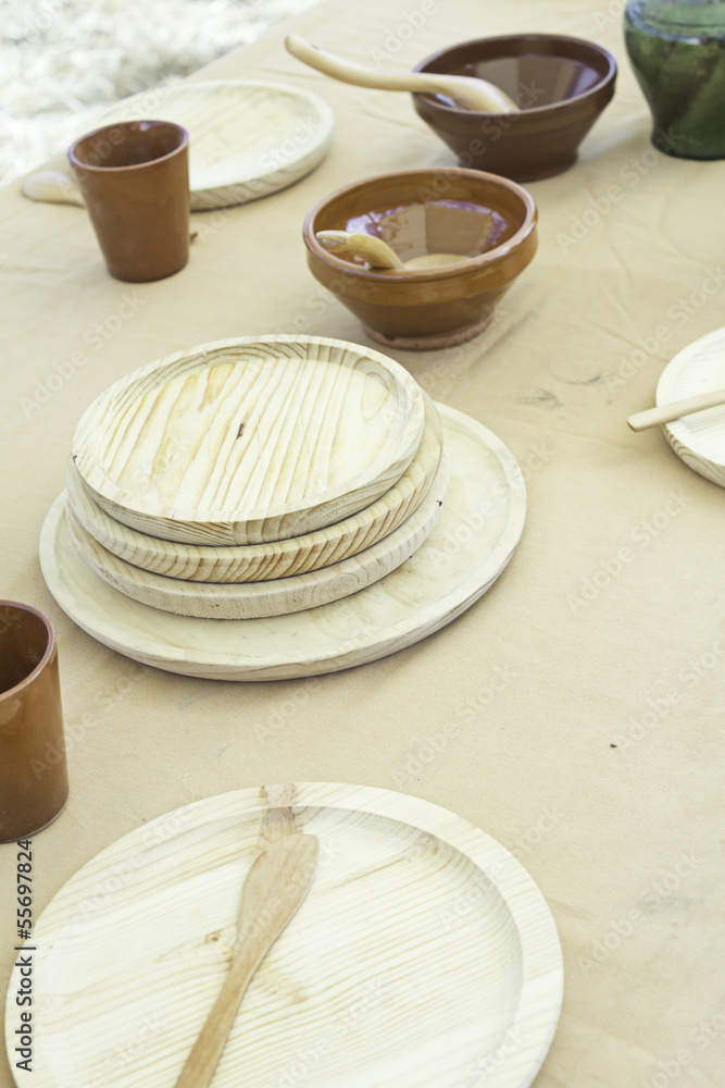 Table with wood and ceramic tableware