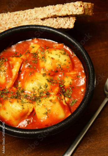 cheese ravioli on wood