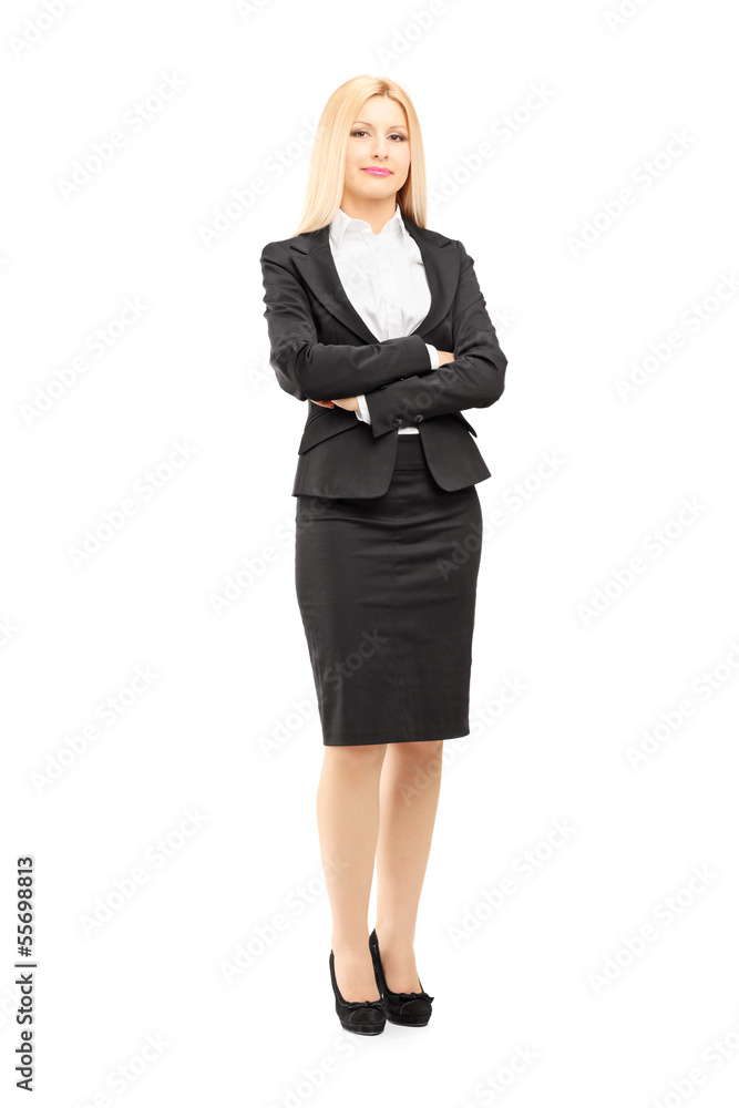 Full length portrait of a blond businesswoman looking at camera Full length portrait of a blond businesswoman looking at camera