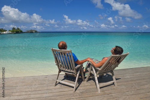 happy young couple have fun on beach