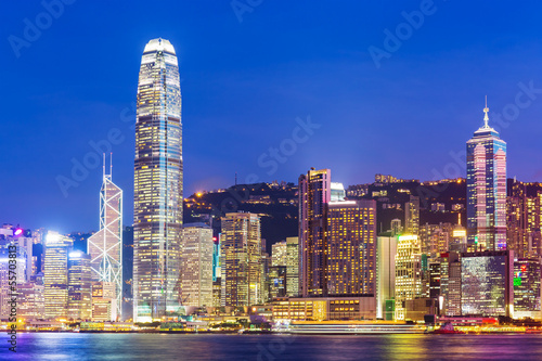 Hong Kong city skyline at night with Victoria Harbor and skyscra