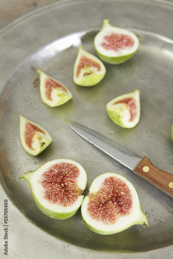 green fresh figs in a plate green fresh figs in a plate