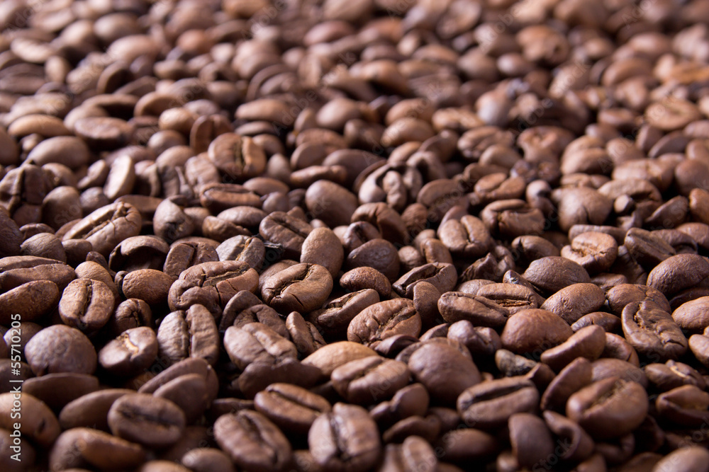 brown background from coffee grains close up brown background from coffee grains close up