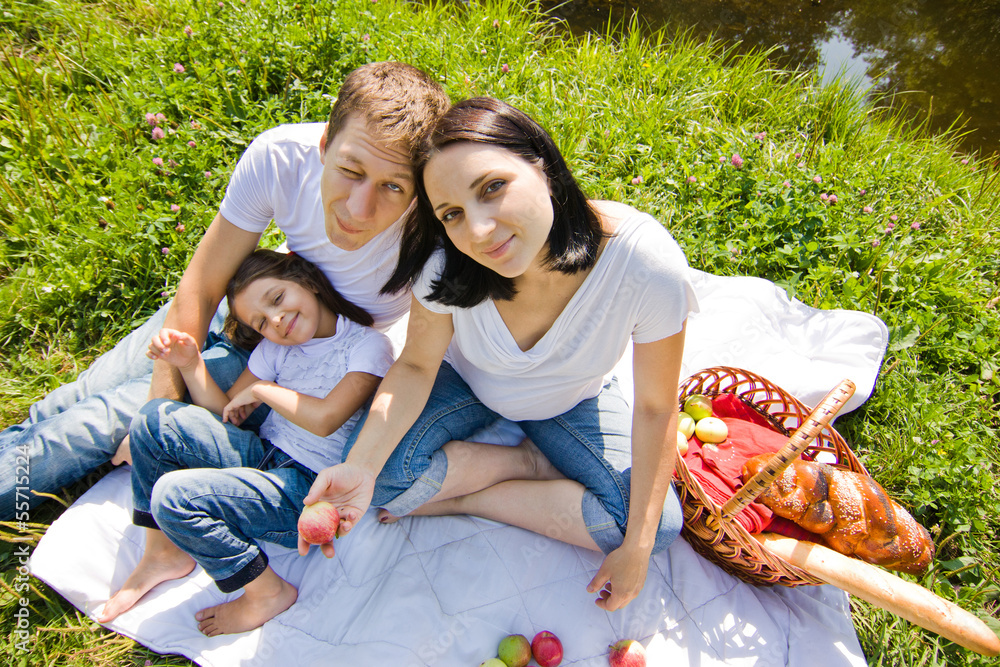 Family picnic near river