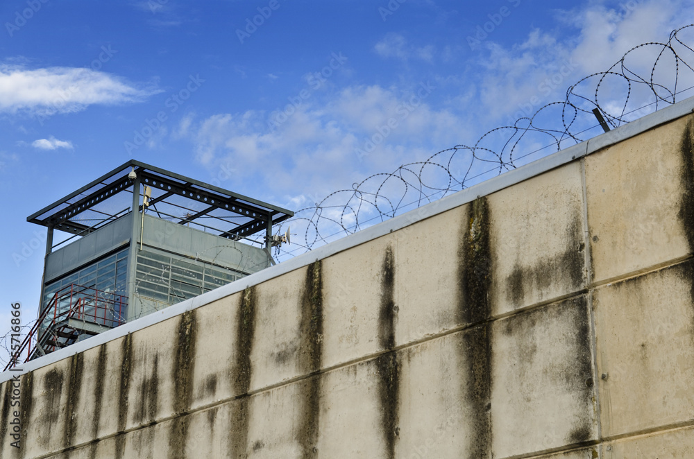 The prison wall. The prison wall.